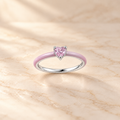 Pink Enamel Heart Ring on beige background