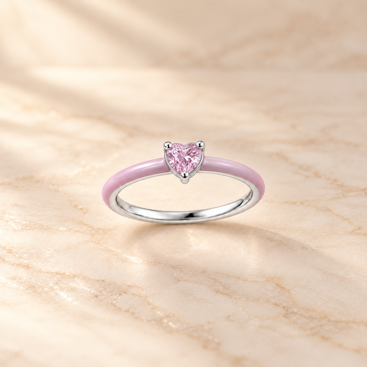 Pink Enamel Heart Ring on beige background