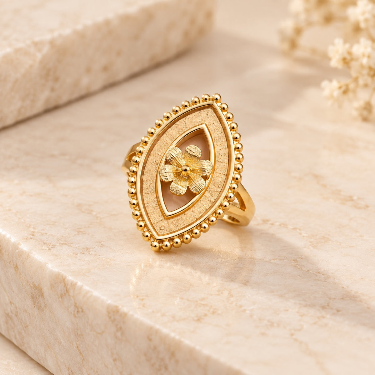 Gold-plated floral statement ring