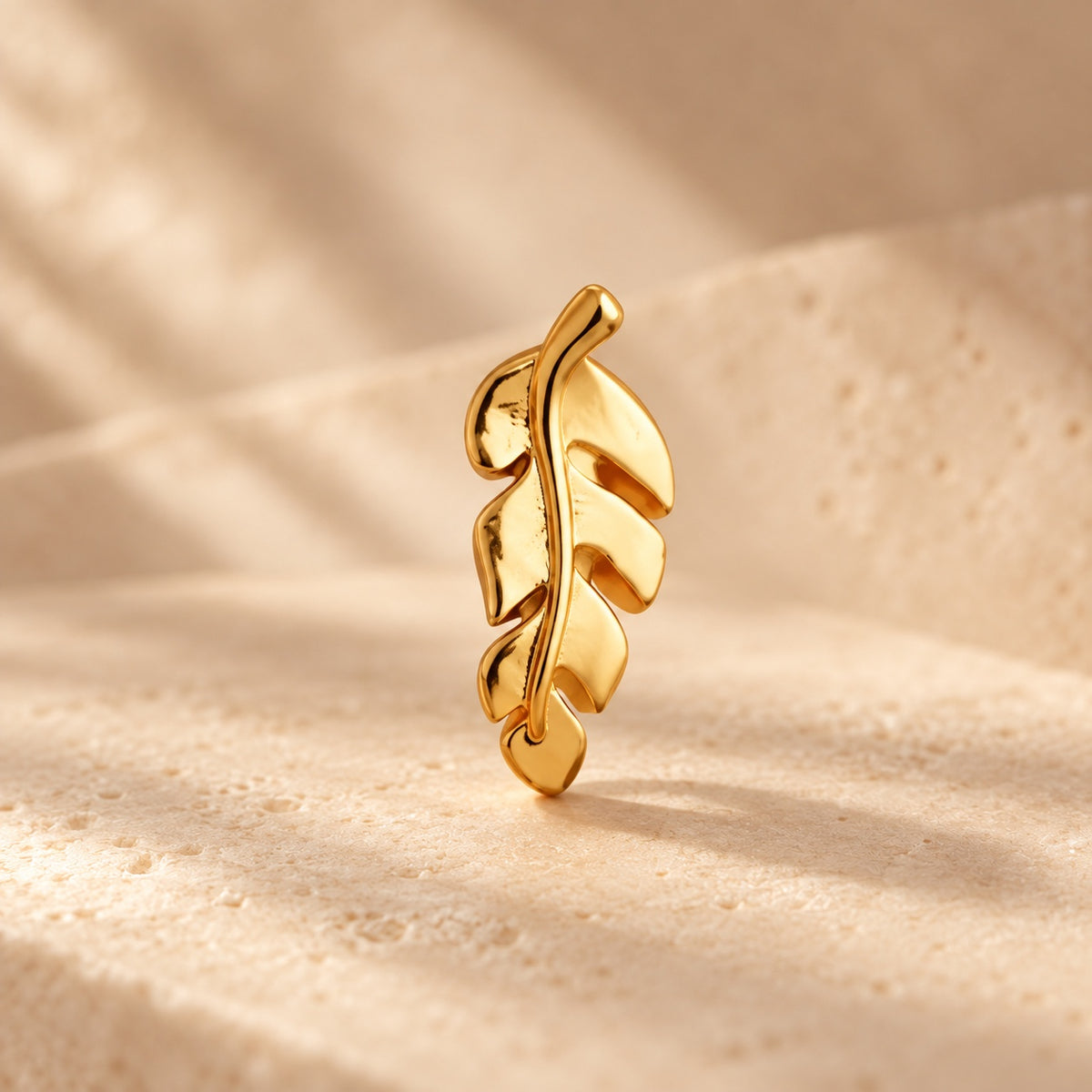 Golden leaf statement earring