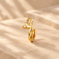 Golden sculpted curve hoop earring