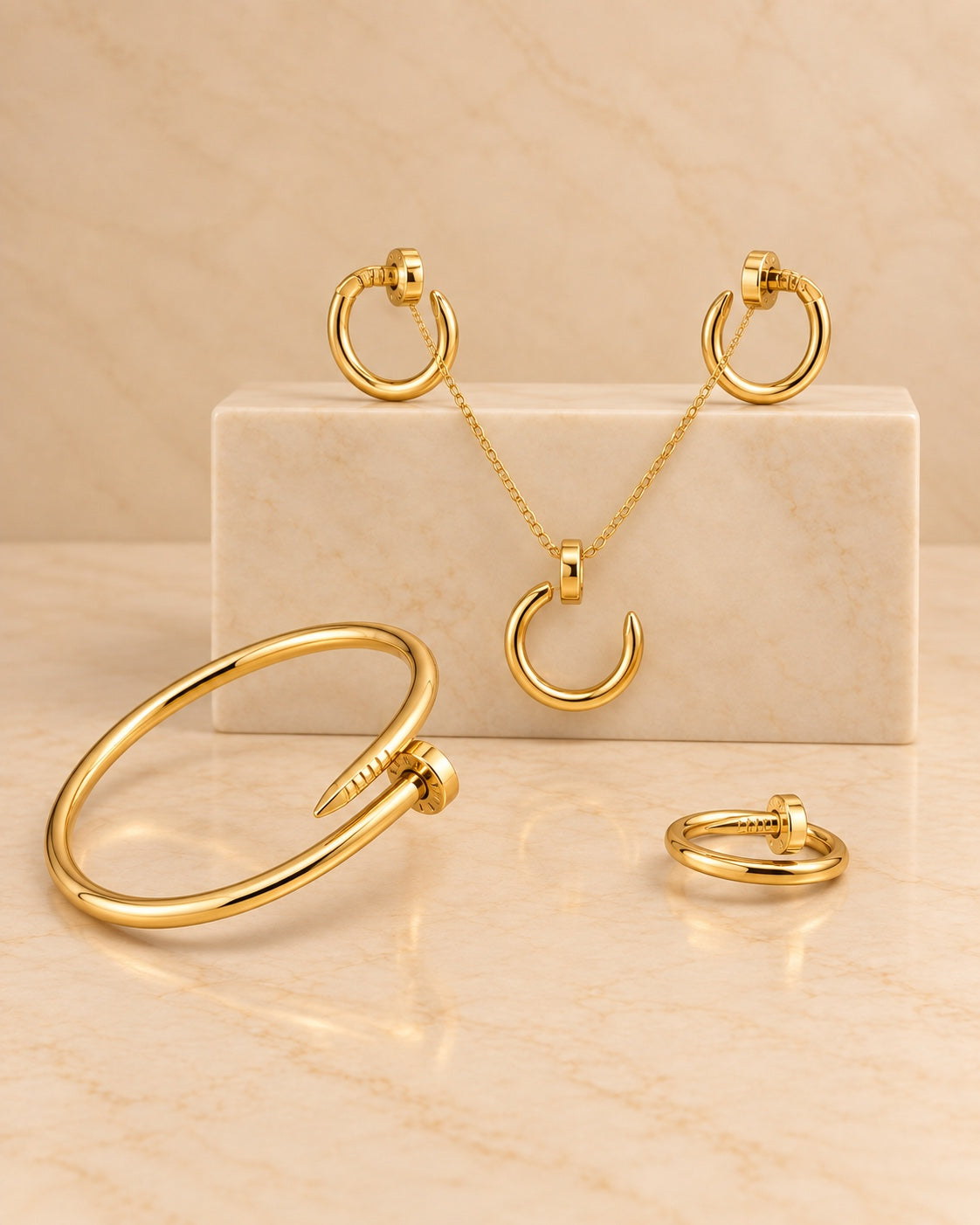 Gold nail inspired jewelry set