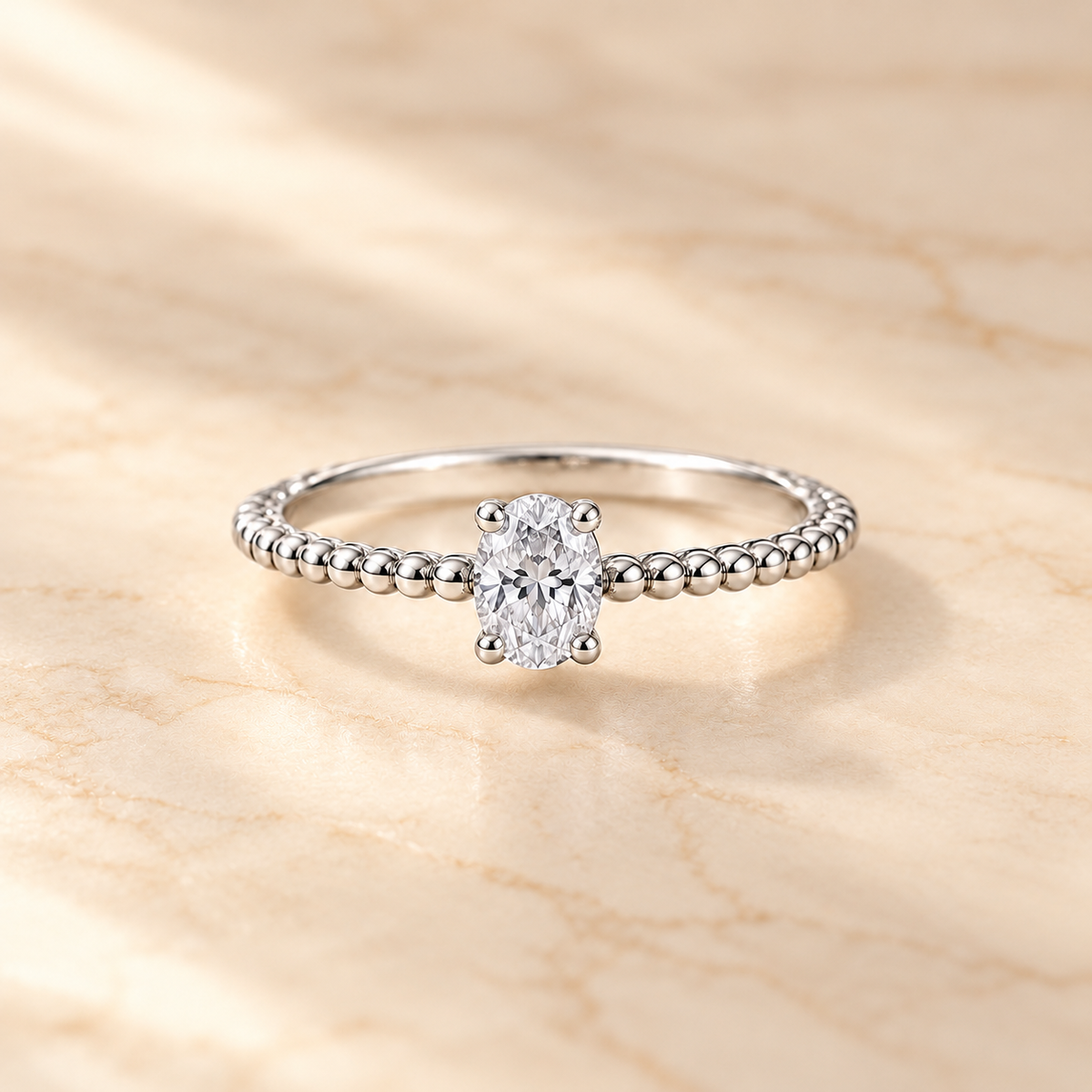 Oval Solitaire Ring on beige background