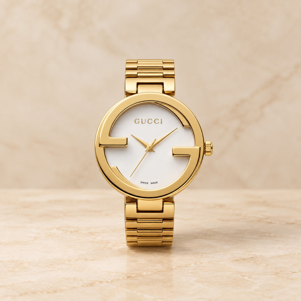 Gold round watch with white dial