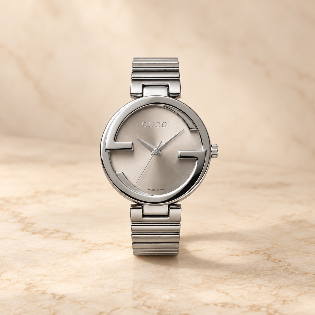 Silver round watch with champagne dial